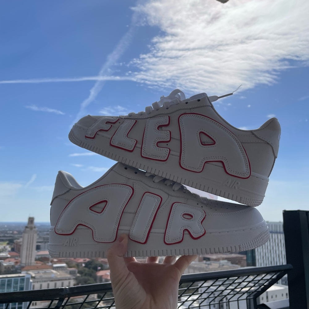 White Sneakers with Red Lettering